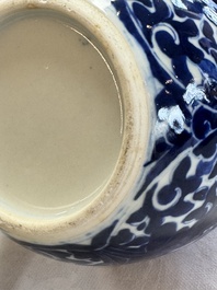 A pair of Chinese blue and white 'Lotus Scroll' jars, 19th C.