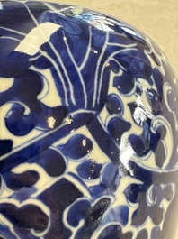 A pair of Chinese blue and white 'Lotus Scroll' jars, 19th C.