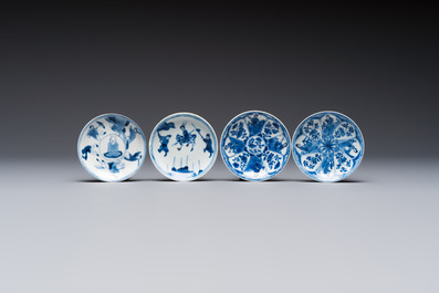 23 Chinese blue and white saucers with figural design, Yongzheng/Kangxi