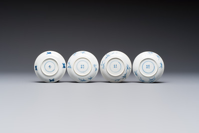 23 Chinese blue and white saucers with figural design, Yongzheng/Kangxi