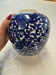 A pair of Chinese blue and white 'Lotus Scroll' jars, 19th C.