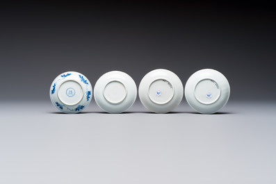 23 Chinese blue and white saucers with figural design, Yongzheng/Kangxi