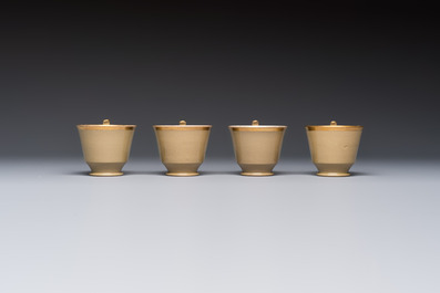 A 24-piece English Spode mocha-ground and gilt coffee and tea service, 19th C.