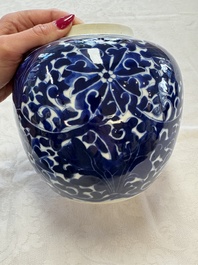 A pair of Chinese blue and white 'Lotus Scroll' jars, 19th C.