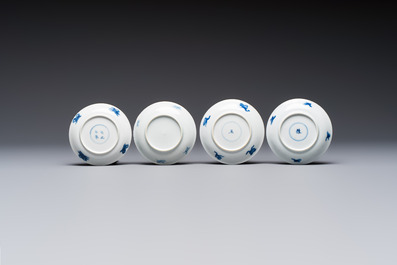 23 Chinese blue and white saucers with figural design, Yongzheng/Kangxi