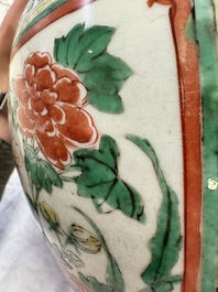 A Chinese wucai 'Landscapes and Flowers' vase, Transitional period