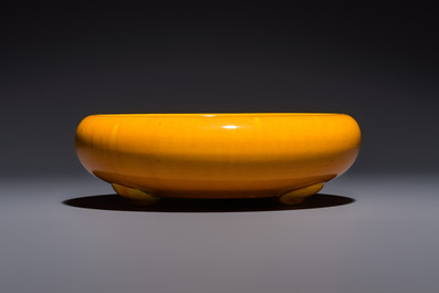A Japanese Awaji orange-glazed brush washer, marked, and a blue-glazed vase, 19/20th C.