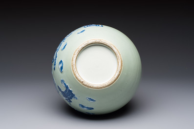 A Chinese blue and white celadon-ground 'Sanxing' bottle vase with relief design, 19th C.