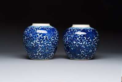 A pair of Chinese blue and white 'Lotus Scroll' jars, 19th C.