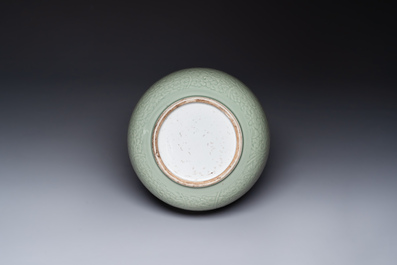 A Chinese celadon-glazed bowl with incised chilong among floral scrolls, Kangxi