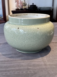 A Chinese celadon-glazed bowl with incised chilong among floral scrolls, Kangxi