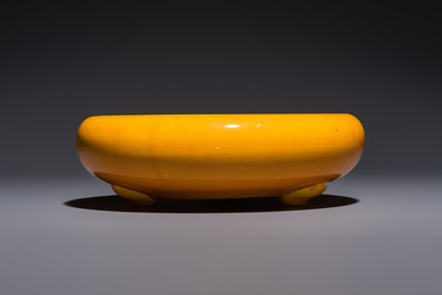 A Japanese Awaji orange-glazed brush washer, marked, and a blue-glazed vase, 19/20th C.