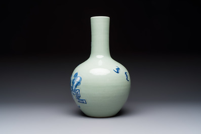 A Chinese blue and white celadon-ground 'Sanxing' bottle vase with relief design, 19th C.