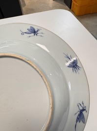 A Chinese blue and white 'La Dame au Parasol' plate after Cornelis Pronk, Qianlong