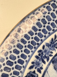 A Chinese blue and white 'La Dame au Parasol' plate after Cornelis Pronk, Qianlong