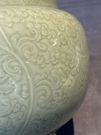 A Chinese celadon-glazed bowl with incised chilong among floral scrolls, Kangxi