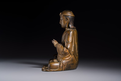 A Chinese gilt-lacquered wooden seated Bodhisattva, Ming