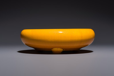 A Japanese Awaji orange-glazed brush washer, marked, and a blue-glazed vase, 19/20th C.