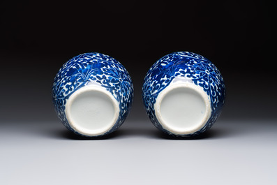 A pair of Chinese blue and white 'Lotus Scroll' jars, 19th C.