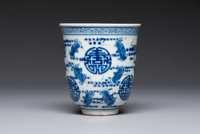A Chinese blue and white vase and a vessel, 19th C.