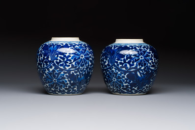 A pair of Chinese blue and white 'Lotus Scroll' jars, 19th C.