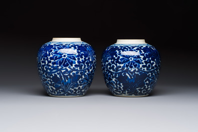 A pair of Chinese blue and white 'Lotus Scroll' jars, 19th C.
