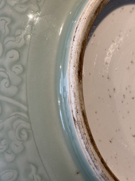 A Chinese celadon-glazed bowl with incised chilong among floral scrolls, Kangxi