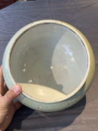 A Chinese celadon-glazed bowl with incised chilong among floral scrolls, Kangxi