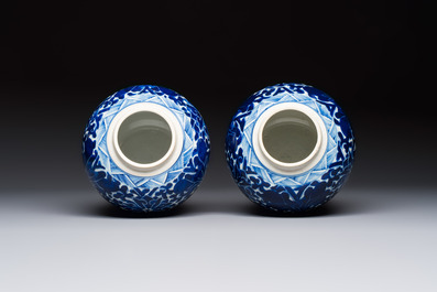 A pair of Chinese blue and white 'Lotus Scroll' jars, 19th C.