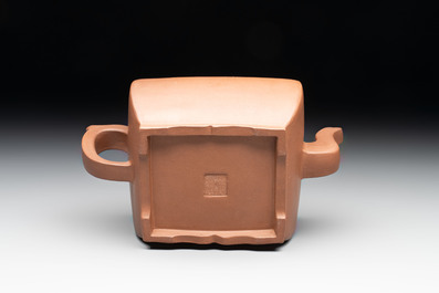 A Chinese Yixing stoneware 'lion and brocade ball' teapot and cover, 19/20th C.
