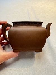 A Chinese Yixing stoneware 'lion and brocade ball' teapot and cover, 19/20th C.