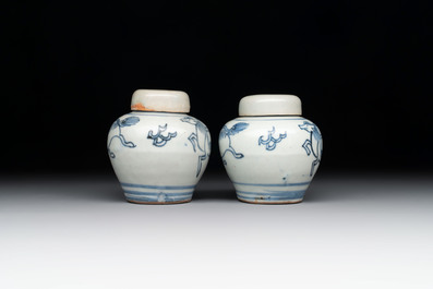 A pair of Chinese incised white-glazed 'Meiping' vases, Wanli mark and of the period, and a pair of blue and white covered jarlets, Ming