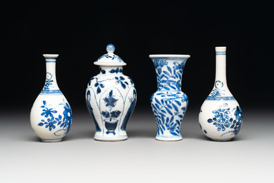 Four Chinese blue and white miniature vases, one with cover, Kangxi