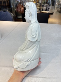 A Chinese white-glazed Guanyin, Kangxi mark, 19th C.