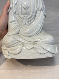 A Chinese white-glazed Guanyin, Kangxi mark, 19th C.