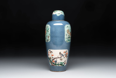 A Chinese famille verte powder-blue-ground 'Fish and Bird' vase and cover, 19th C.