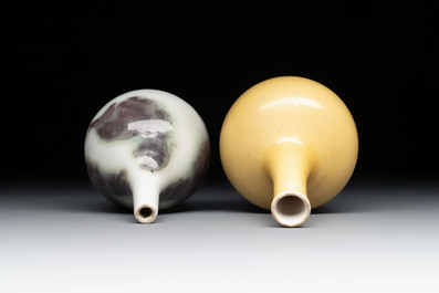 A Chinese copper-red and white 'Mythical Beasts' vase and a yellow-glazed bottle vase, on later wooden stands, Kangxi and later