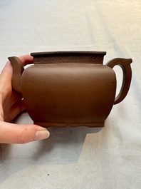 A Chinese Yixing stoneware 'lion and brocade ball' teapot and cover, 19/20th C.