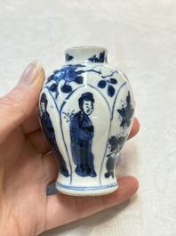 Four Chinese blue and white miniature vases, one with cover, Kangxi