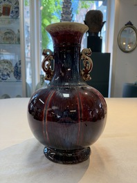 A Chinese flamb&eacute;-glazed vase with 'chilong' handles, 20th C.