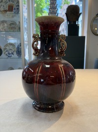 A Chinese flamb&eacute;-glazed vase with 'chilong' handles, 20th C.