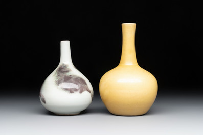 A Chinese copper-red and white 'Mythical Beasts' vase and a yellow-glazed bottle vase, on later wooden stands, Kangxi and later