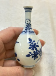 Four Chinese blue and white miniature vases, one with cover, Kangxi