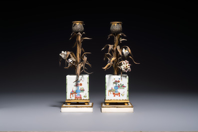 A pair of gilt silver and metal candlesticks with Chinese porcelain, European porcelain flowers, and marble bases, marked Boin-Taburet, late 19th C.