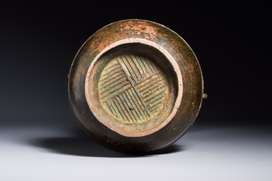 A miniature Chinese archaic bronze wine vessel with Taotie handles, 'Hu 壺', Han