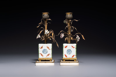 A pair of gilt silver and metal candlesticks with Chinese porcelain, European porcelain flowers, and marble bases, marked Boin-Taburet, late 19th C.