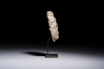 A Gandhara grey schist relief fragment of a Bodhisattva head, 3rd/4th C.