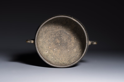 A Chinese bronze censer with Arabic inscription and double fish-form handles, Xuande mark, 17/18th C.
