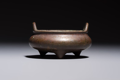 A Chinese bronze handled tripod censer, Yu Tang Jing Wan 玉堂精玩 mark, 17th C.