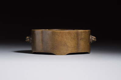 Two Chinese bronze censers, one with a wooden cover,  Ti An 惕庵 mark, 19th C.